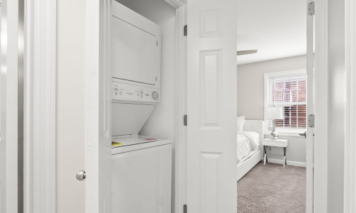 a closest with a washer and dryer